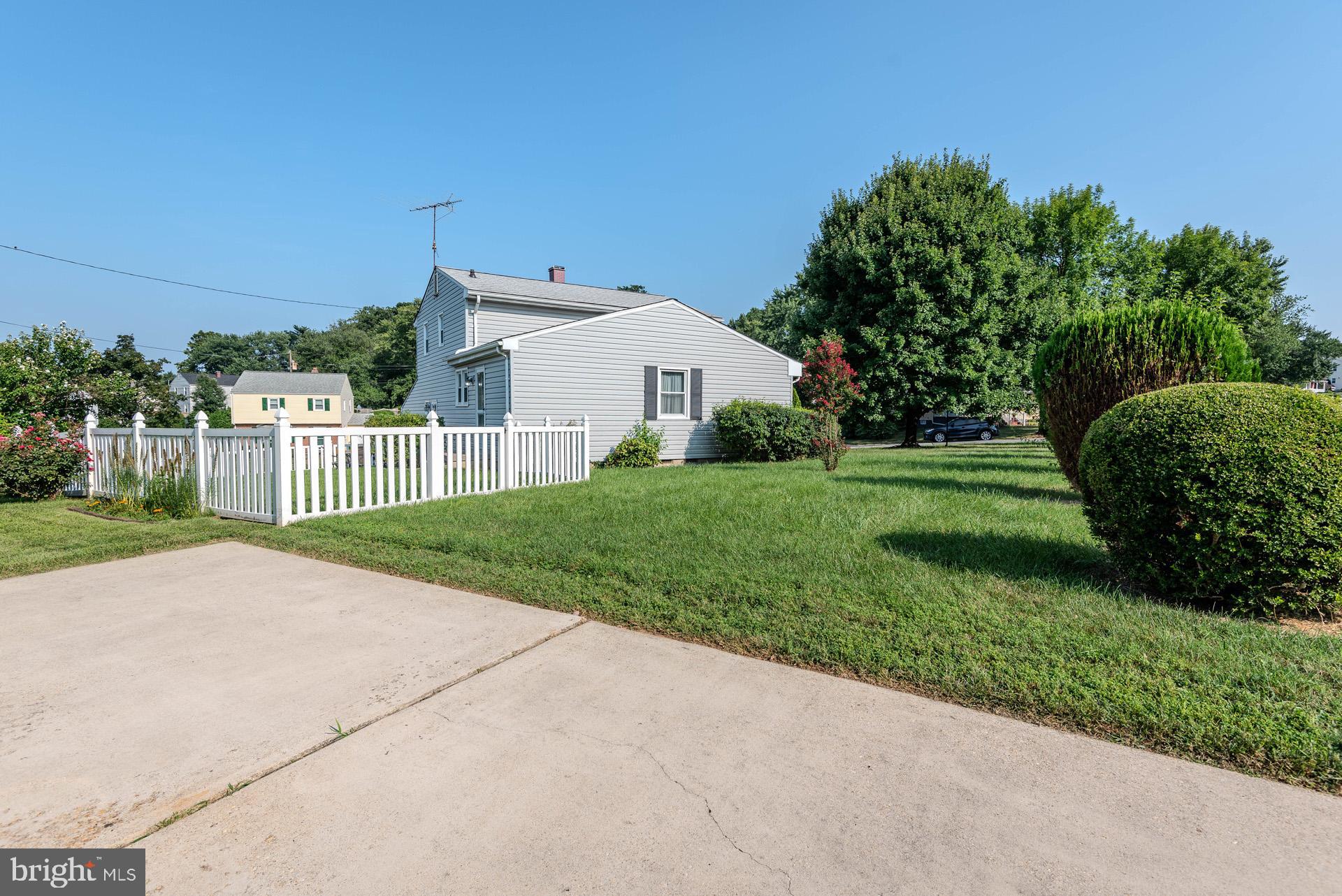 208 Ardmore Road Linthicum Heights, MD 21090 - Photo 35 of 58 a view of a house with a yard