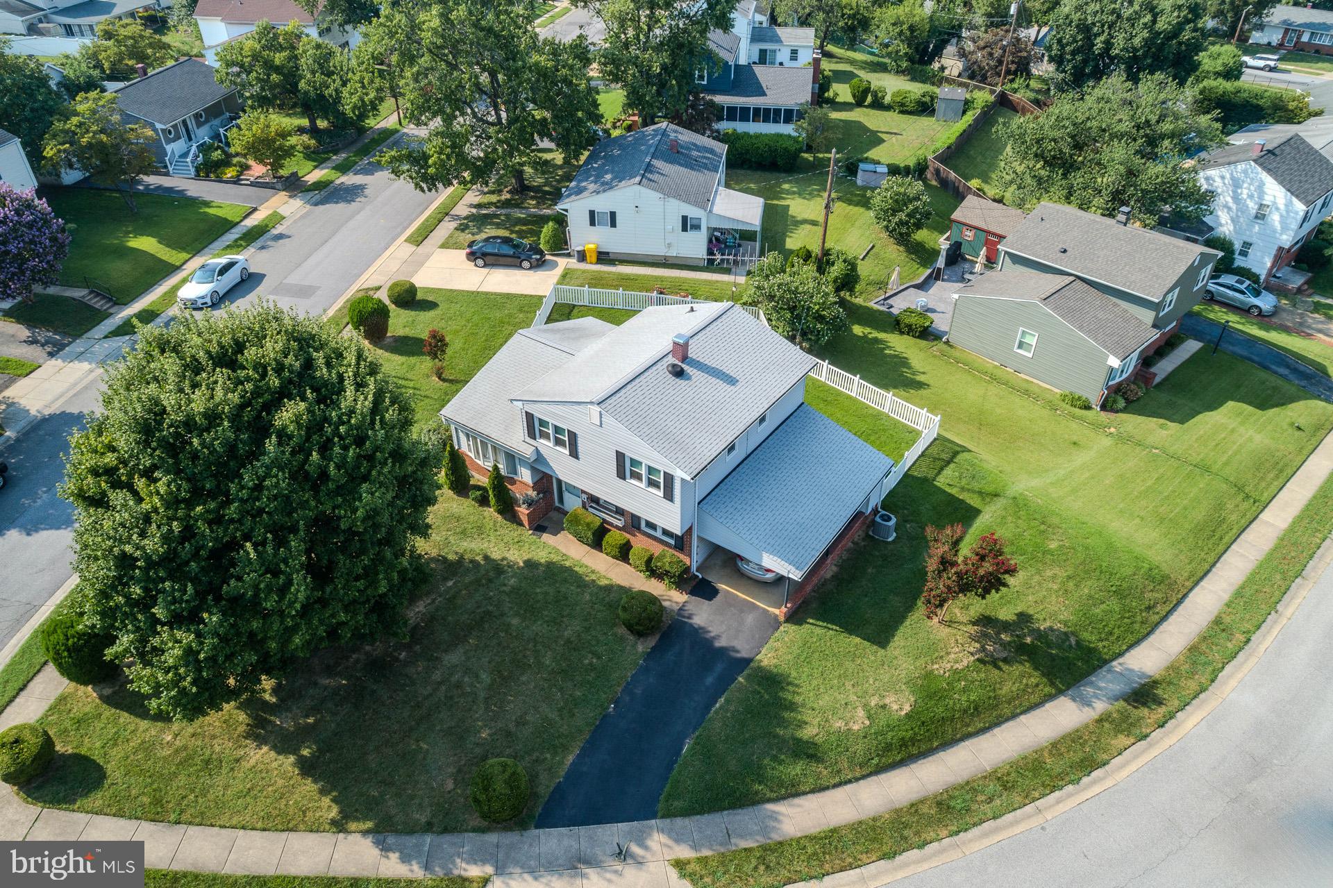 208 Ardmore Road Linthicum Heights, MD 21090 - Photo 6 of 58 an aerial view of a house with a garden