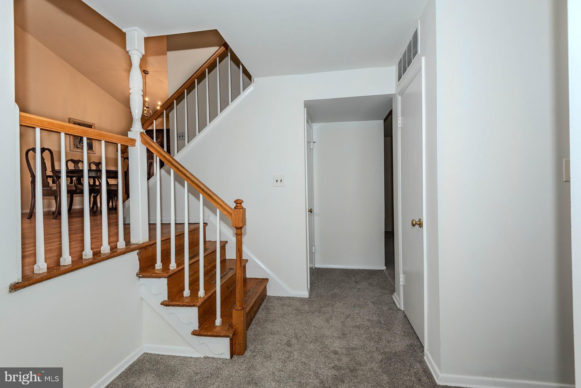 208 Ardmore Road Linthicum Heights, MD 21090 - Photo 9 of 58 a view of a hallway with staircase