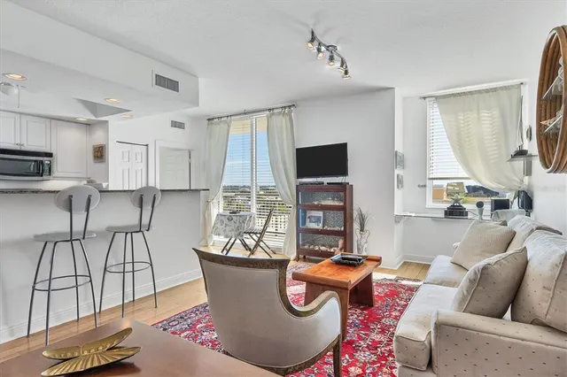 a living room with furniture and a table