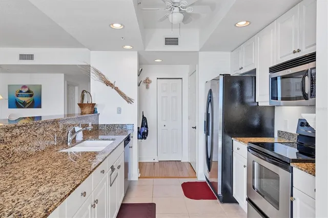 a kitchen with a stove and a microwave