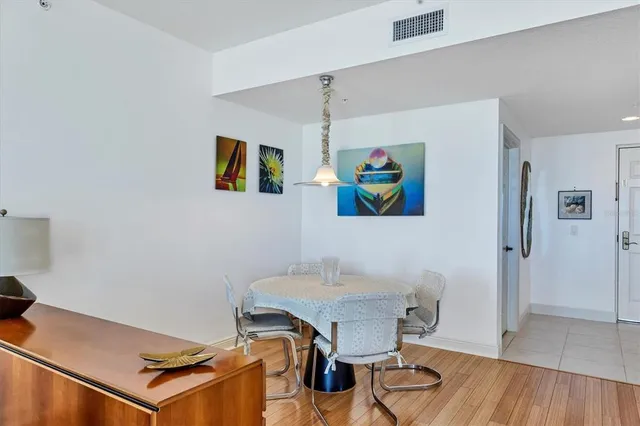 a bathroom with a sink mirror and toilet