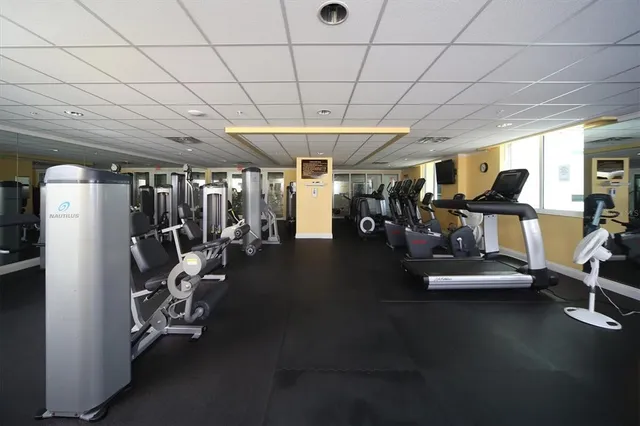 a view of a swimming pool and a chair