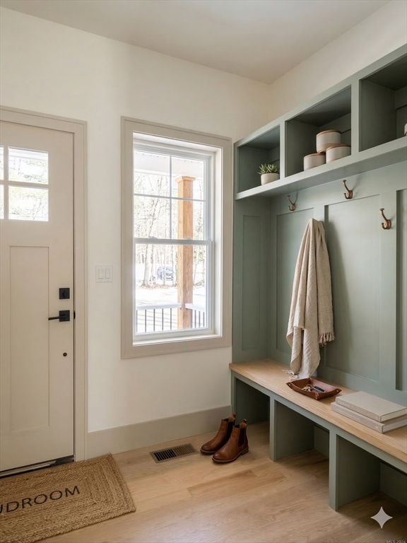 104 Page Road Bedford, MA 01730 - Photo 3 of 24 a room with a window and gym equipment