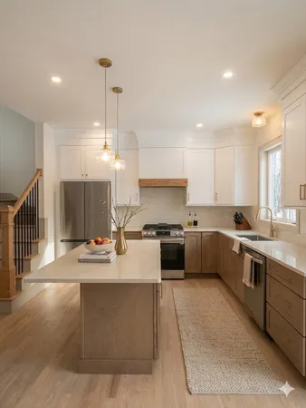 a large white kitchen with stainless steel appliances kitchen island granite countertop a sink counter space and cabinets