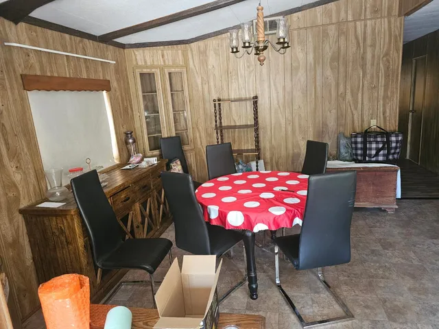 a kitchen with stainless steel appliances granite countertop a refrigerator stove and sink