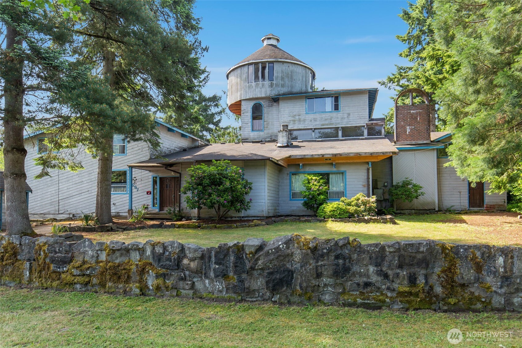1497 Old Military Road Southeast Tenino, WA 98589 - Photo 1 of 34 a front view of a house with garden