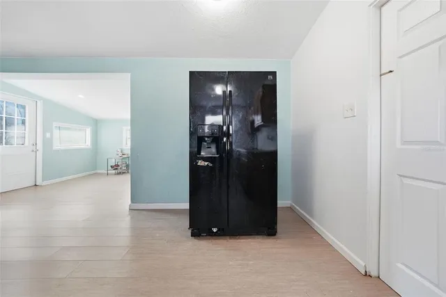 a view of a elevator and an empty room