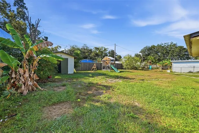 an aerial view of a swimming pool and mountain view