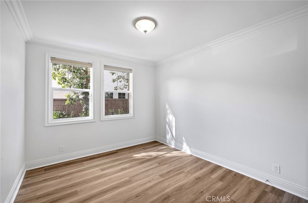 5 Citrus Lane Ladera Ranch, CA 92694 - Photo 18 of 54 a view of an empty room with wooden floor and a window