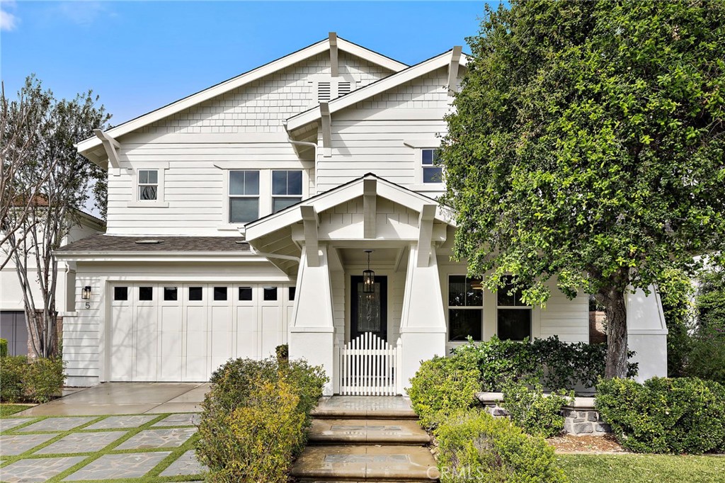 5 Citrus Lane Ladera Ranch, CA 92694 - Photo 2 of 54 a view of a white house with large windows and a small yard