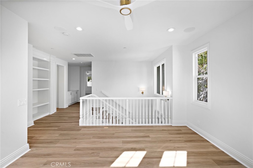 5 Citrus Lane Ladera Ranch, CA 92694 - Photo 25 of 54 a view of a room with wooden floor and windows