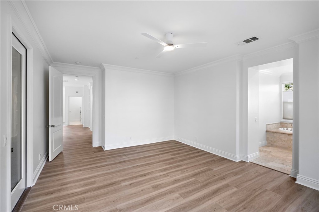 5 Citrus Lane Ladera Ranch, CA 92694 - Photo 33 of 54 a view of hallway with wooden floor