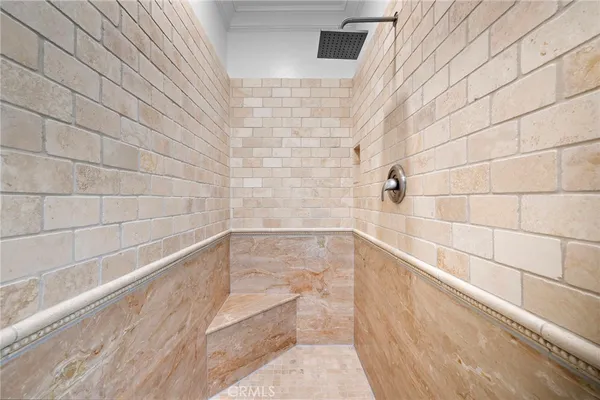 a view of a balcony with wooden floor