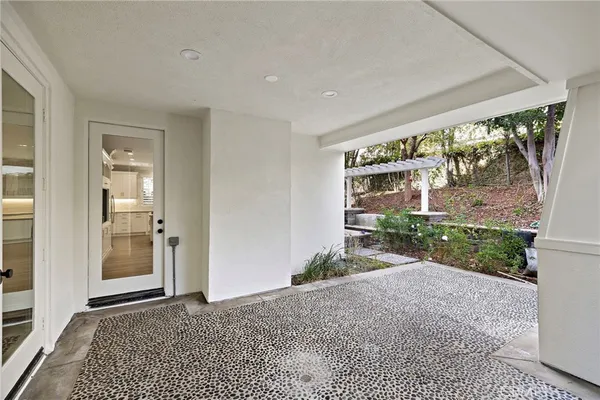 a view of backyard with a patio and outdoor seating