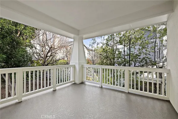 a backyard of a house with outdoor seating