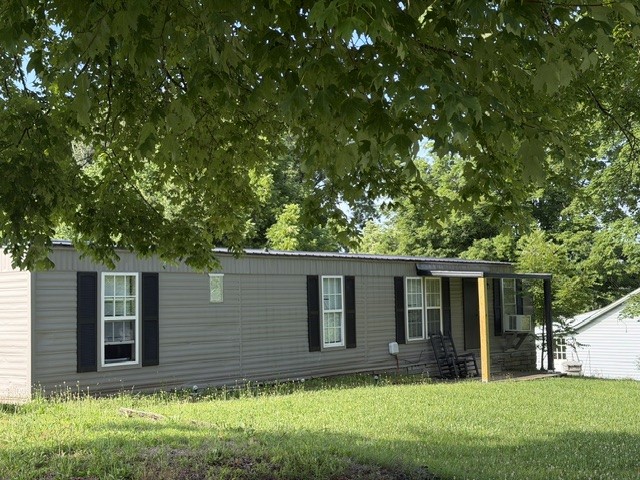 301 Eastbrook Road Estill Springs, TN 37330 - Photo 1 of 7 front view of house with a yard