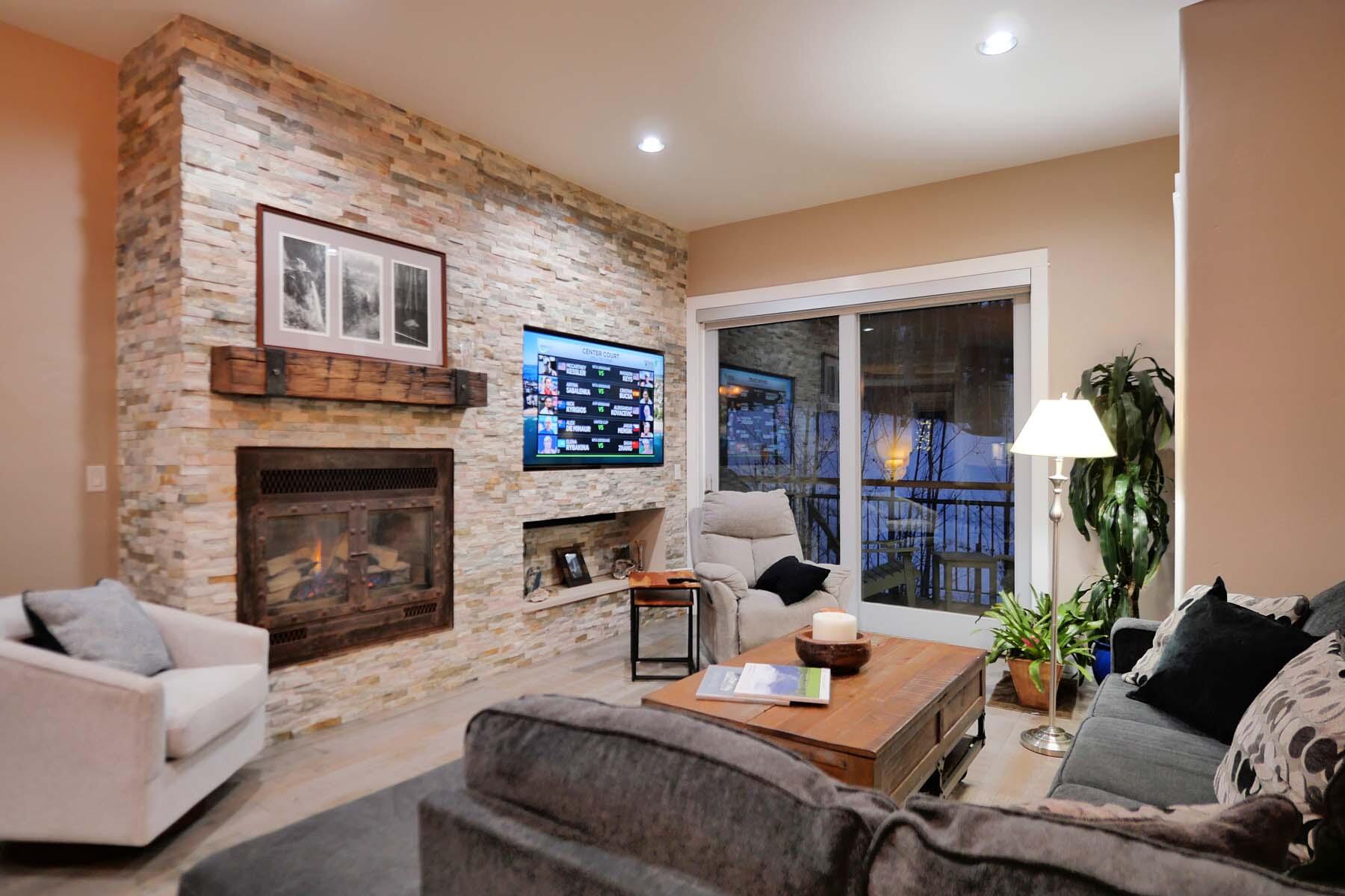 404 Adams Ranch Road, Unit 1201 Mountain Village, CO 81435 - Photo 28 of 47 Evening LR & TV