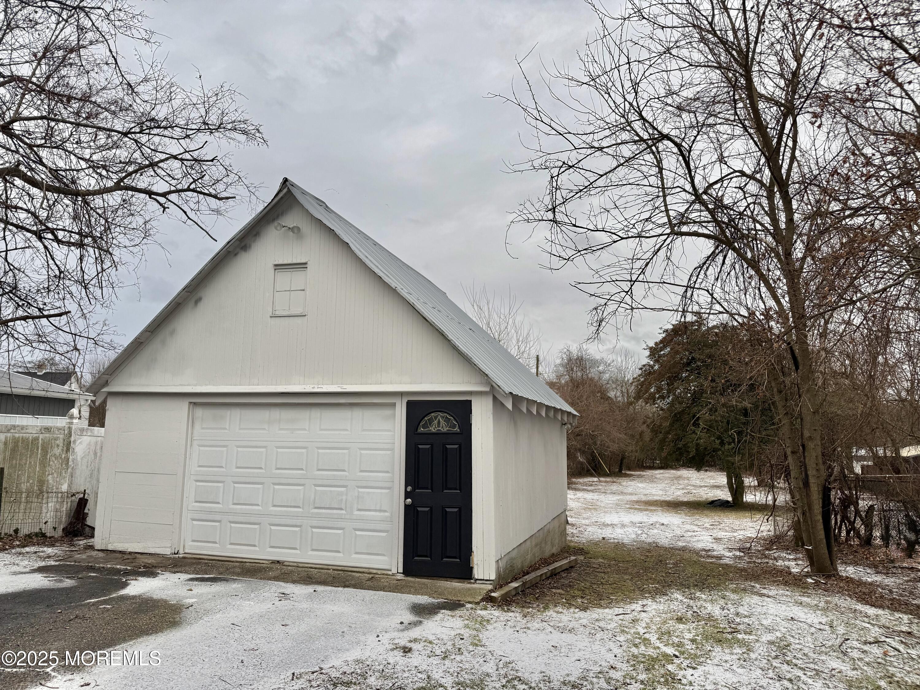 30 New Egypt Cookstown Road New Egypt, NJ 08533 - Photo 20 of 21 a view of a garage with a tree