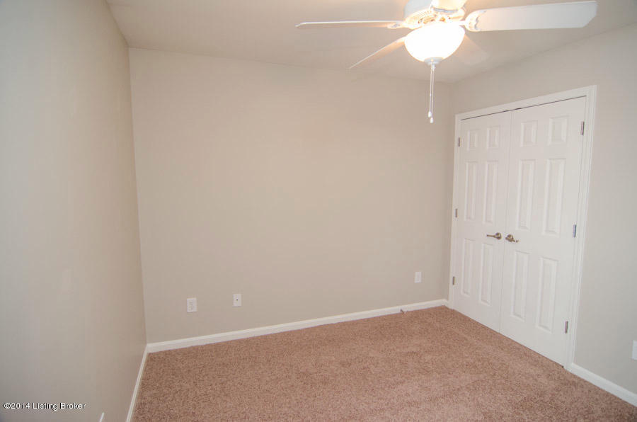 6447 Renate Road Louisville, KY 40291 - Photo 15 of 39 Second bedroom has a big french door closet.