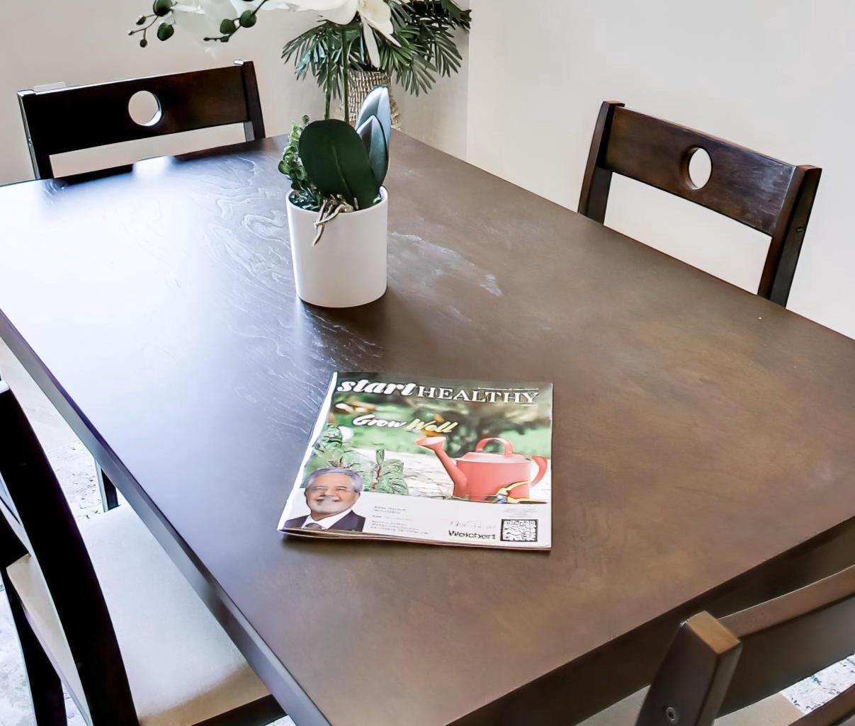 15100 Interlachen Drive, Unit 4612 Silver Spring, MD 20906 - Photo 5 of 19 Inviting Dining Space for Gatherings