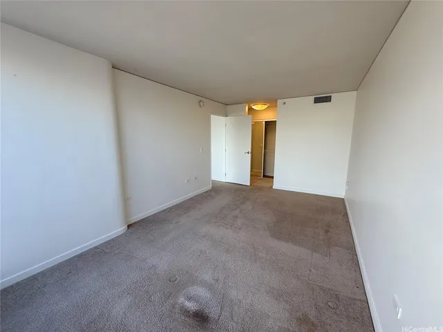 an empty room with a large window