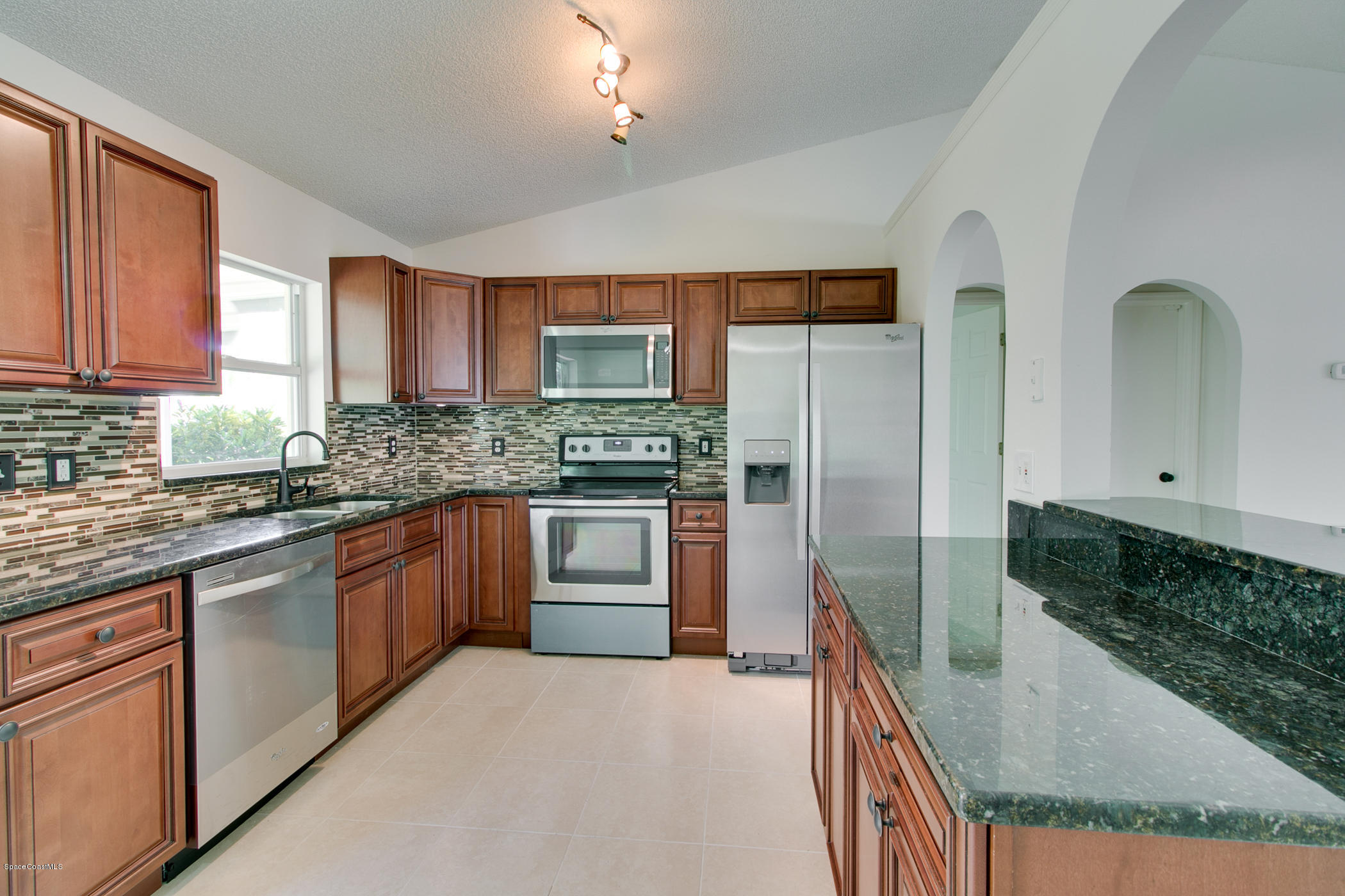 390 Warner Road Southwest Palm Bay, FL 32908 - Photo 12 of 32 Designer Granite Countertops
