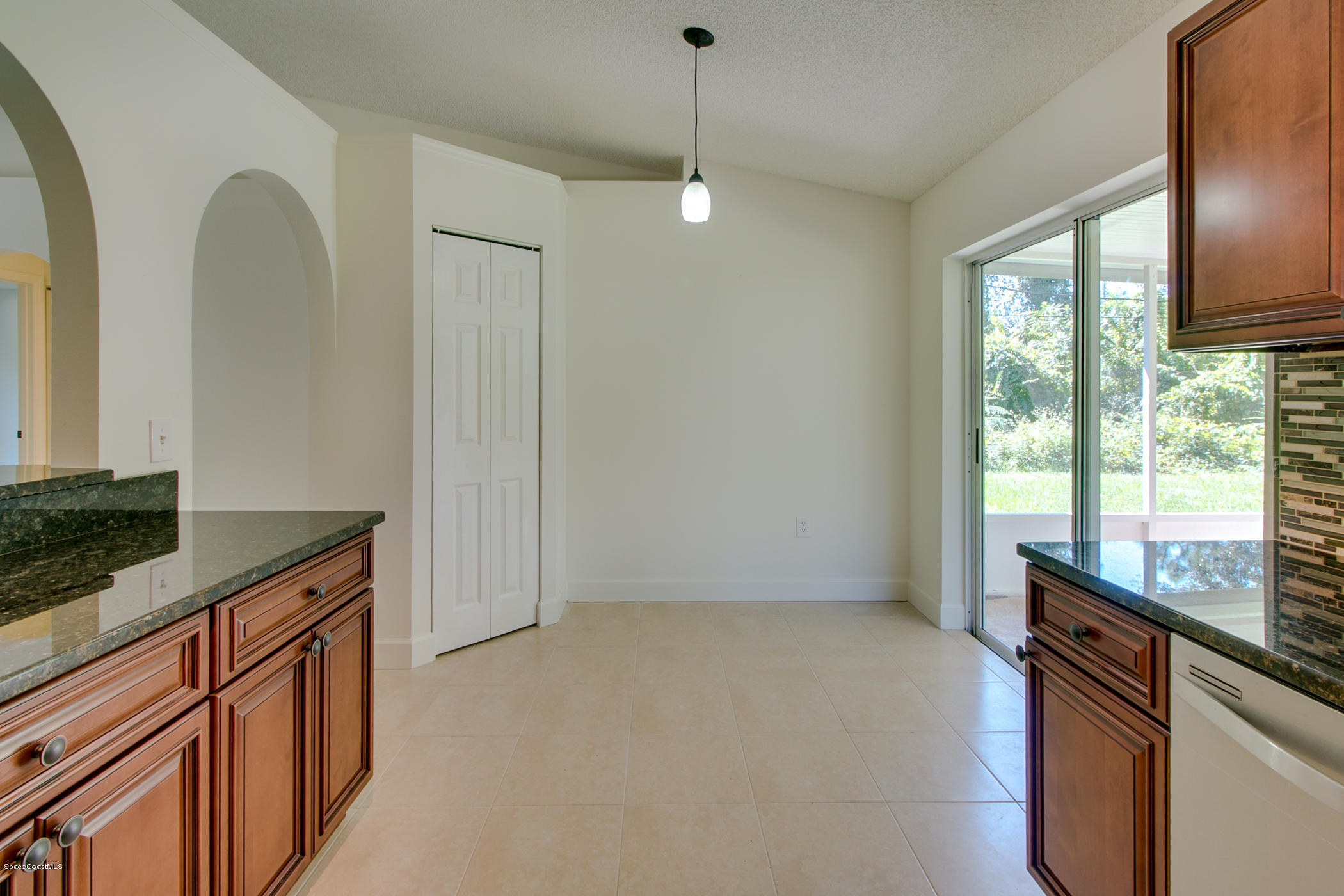 390 Warner Road Southwest Palm Bay, FL 32908 - Photo 15 of 32 Eat In Kitchen Overlooking Back Yard