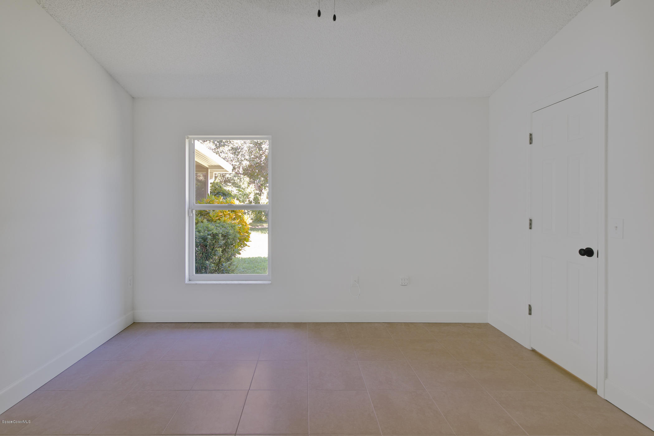 390 Warner Road Southwest Palm Bay, FL 32908 - Photo 16 of 32 Master Bedroom Window