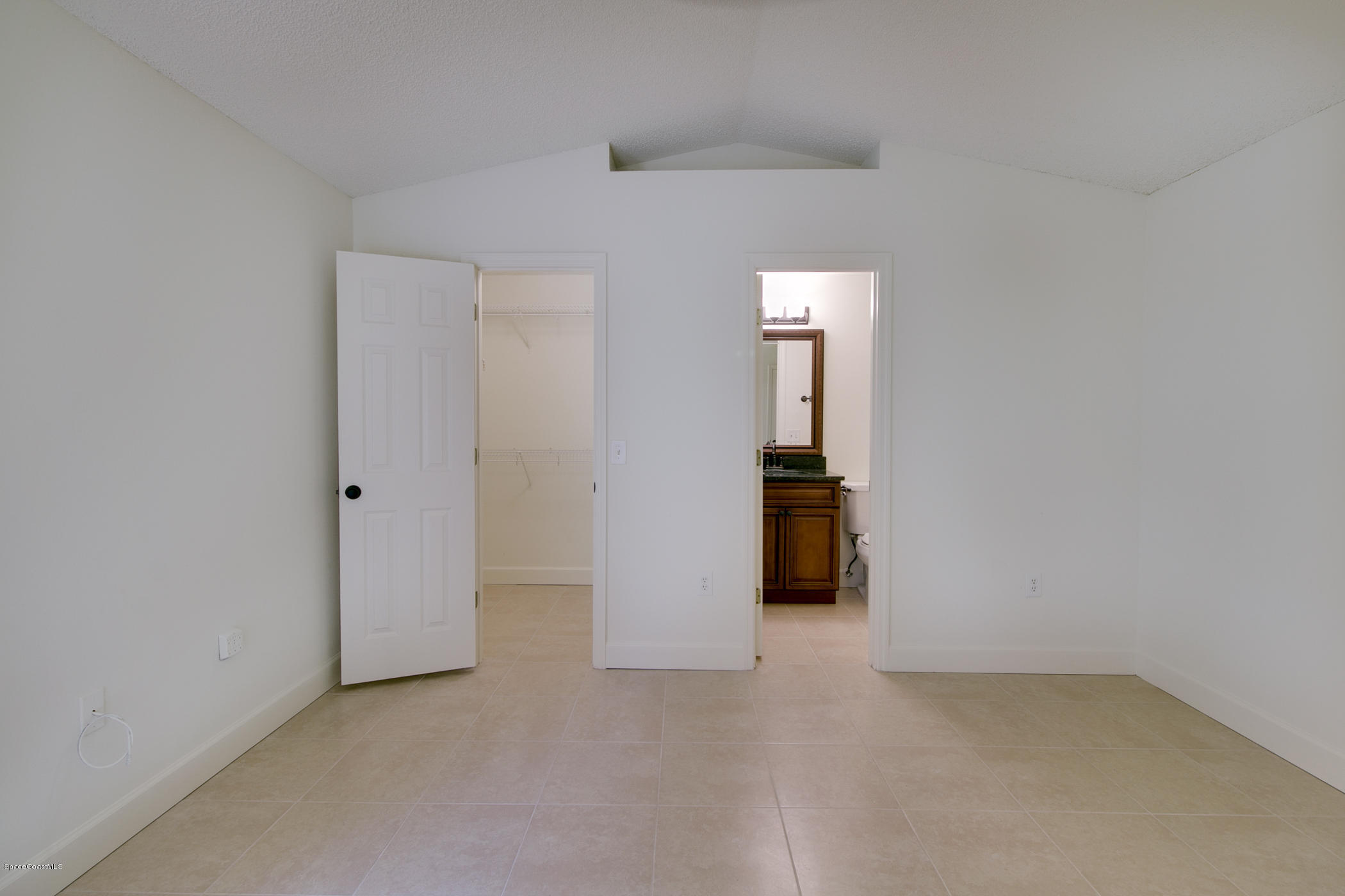 390 Warner Road Southwest Palm Bay, FL 32908 - Photo 17 of 32 Master Suite with Walk In Closet