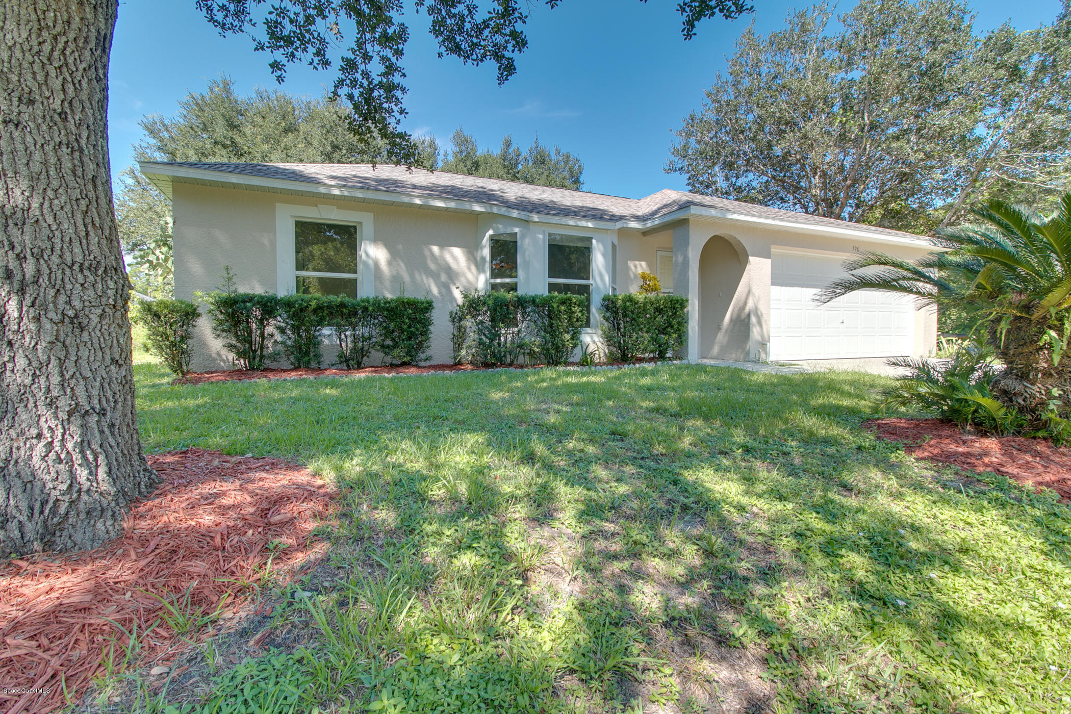 390 Warner Road Southwest Palm Bay, FL 32908 - Photo 3 of 32 SE View of Front of Home