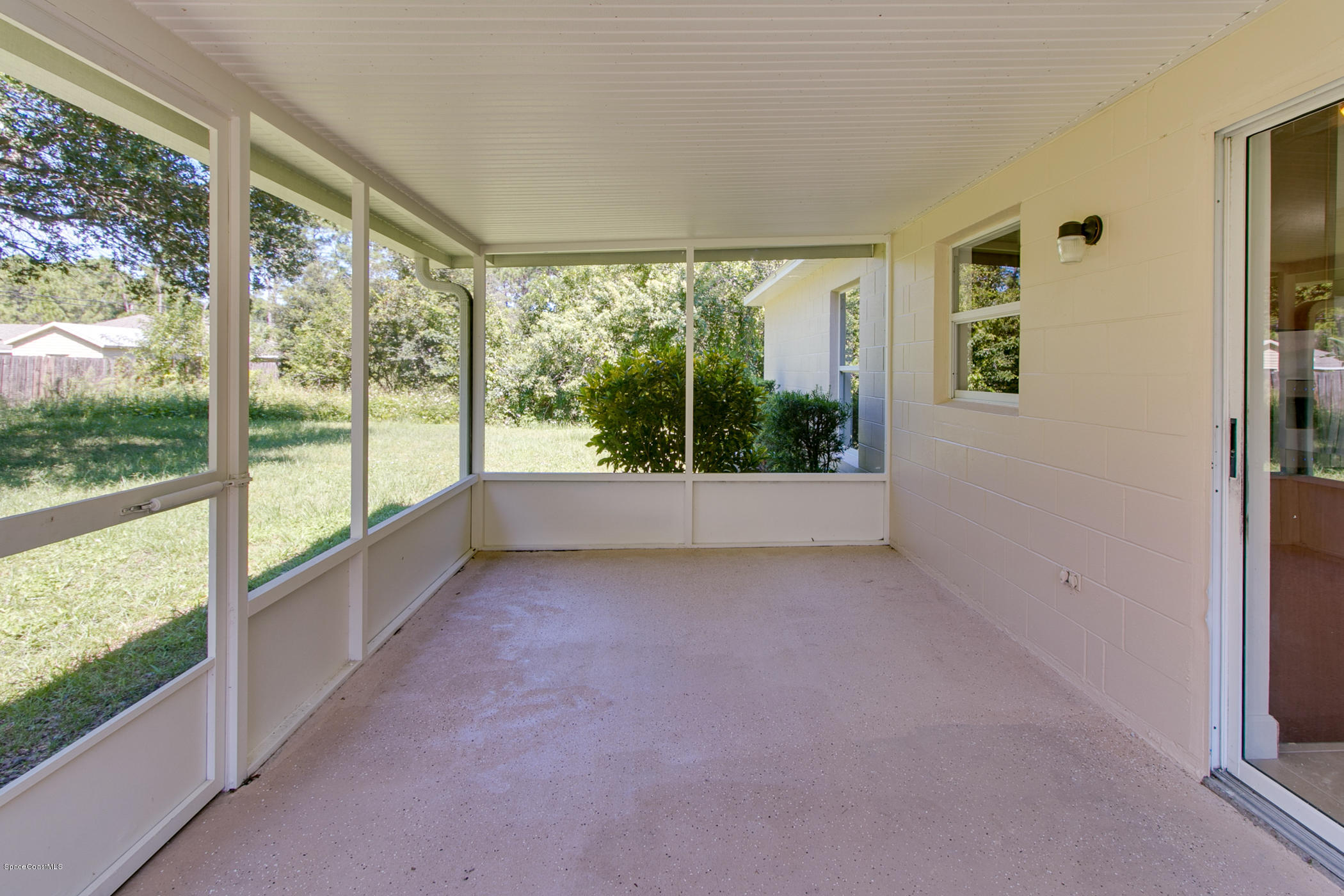 390 Warner Road Southwest Palm Bay, FL 32908 - Photo 28 of 32 Spacious Screened Porch