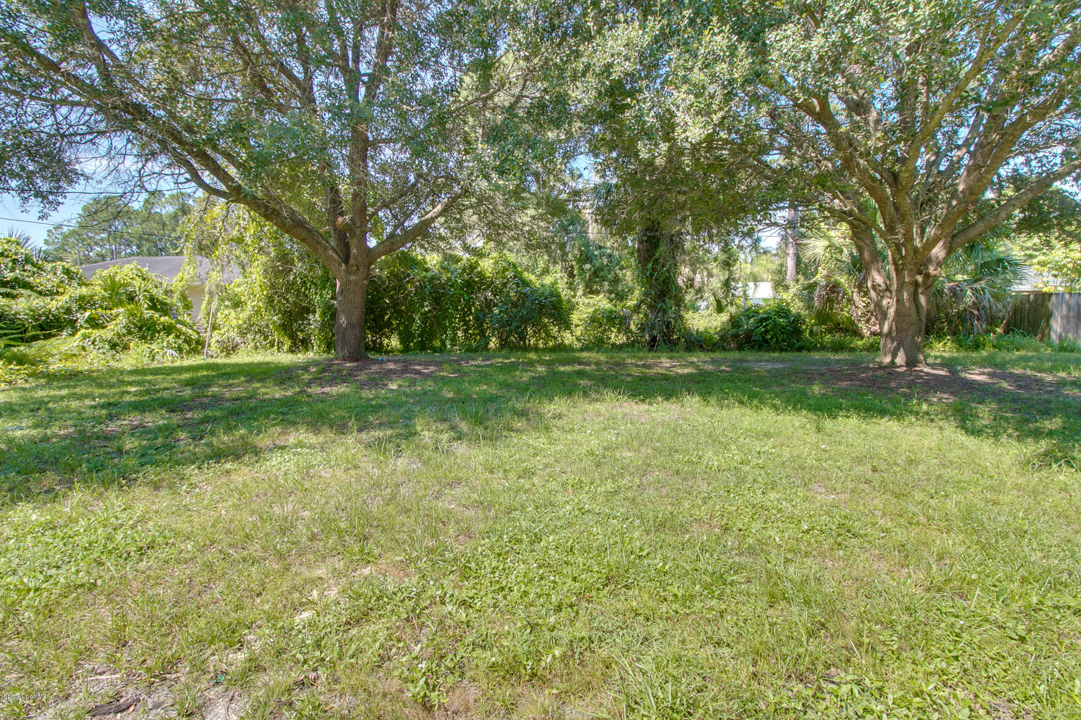 390 Warner Road Southwest Palm Bay, FL 32908 - Photo 30 of 32 Huge Spacious Back Yard