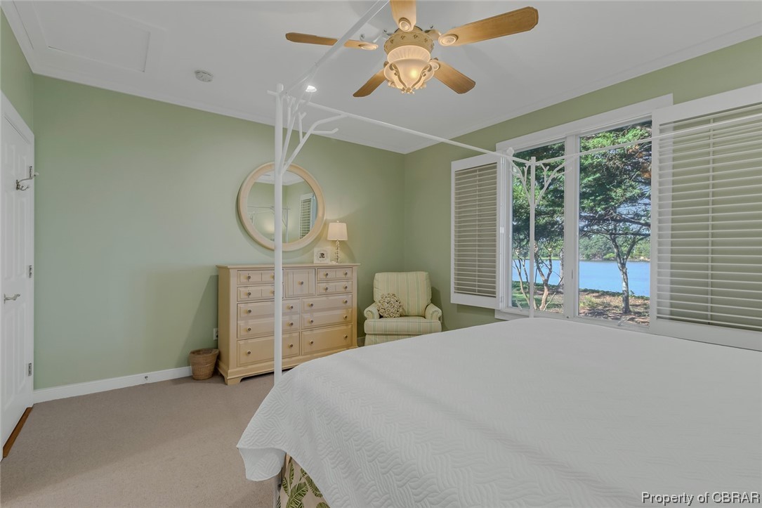 192 Bayberry Point Lane Kilmarnock, VA 22482 - Photo 40 of 49 Bedroom with light carpet and ceiling fan