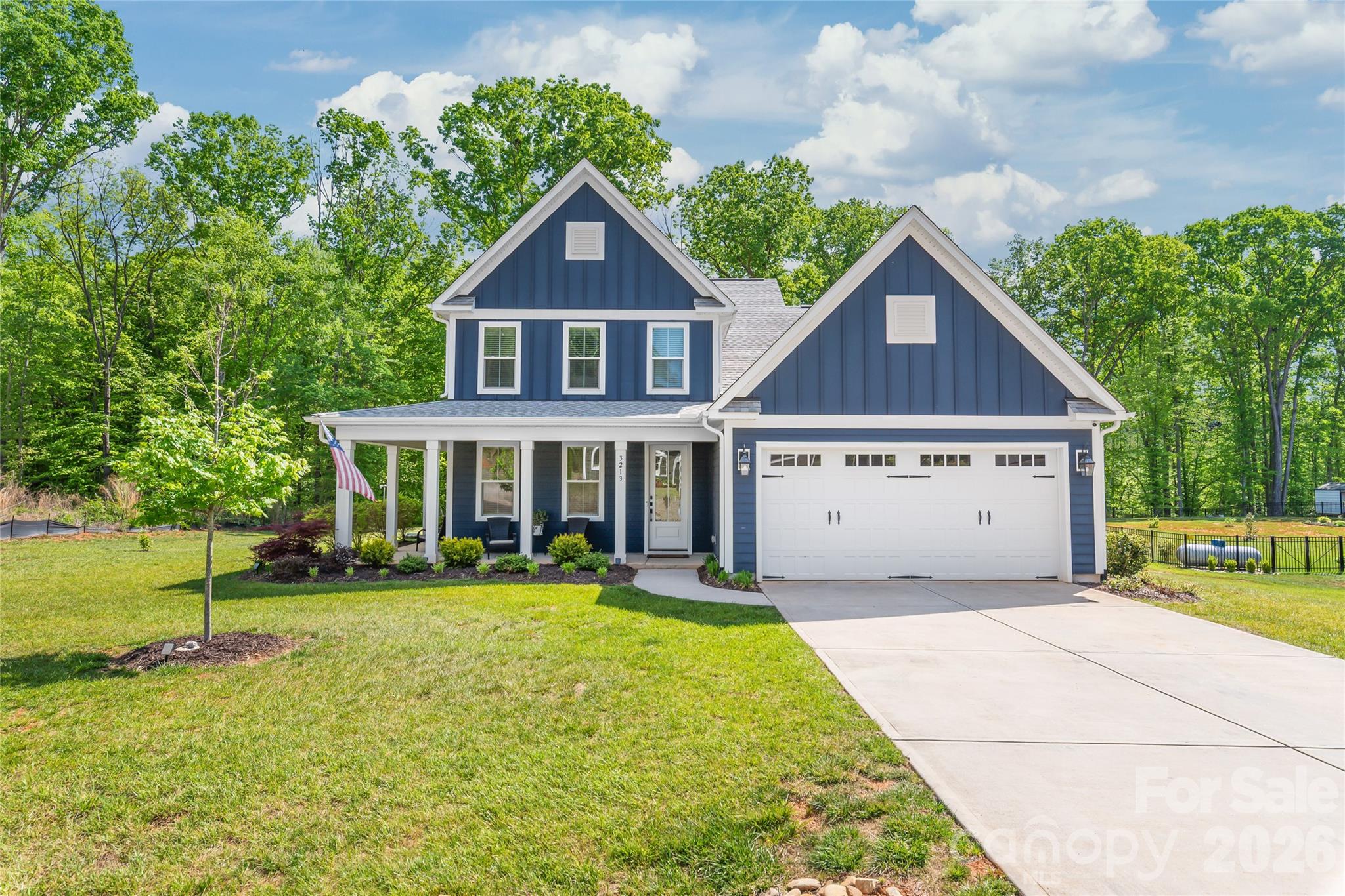 3213 Timber Run Lane Maiden, NC 28650 - Photo 3 of 47 a front view of a house with a yard
