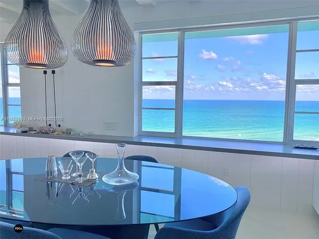 a view of a livingroom from a hallway