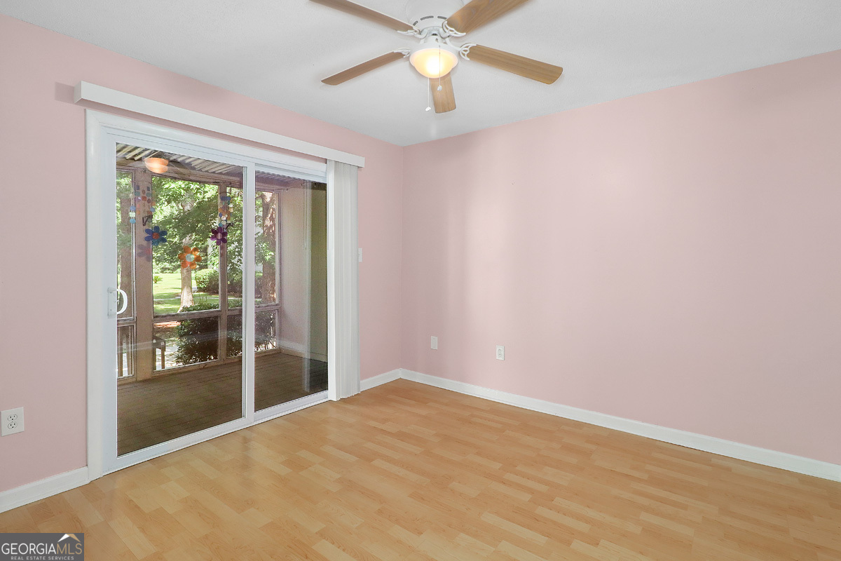 401 North Cromwell Road, Unit 2Q Savannah, GA 31410 - Photo 24 of 35 a view of an empty room with a window