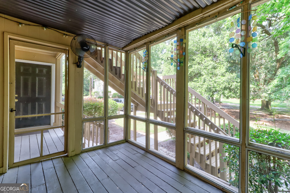401 North Cromwell Road, Unit 2Q Savannah, GA 31410 - Photo 29 of 35 a view of a wooden deck