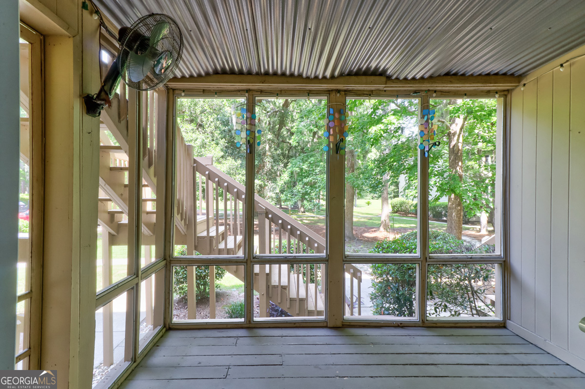 401 North Cromwell Road, Unit 2Q Savannah, GA 31410 - Photo 30 of 35 a view of porch with a garden
