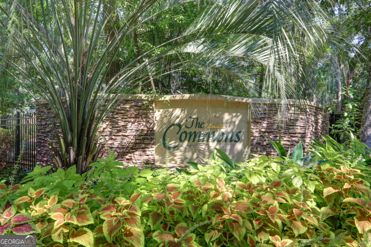 401 North Cromwell Road, Unit 2Q Savannah, GA 31410 - Photo 31 of 35 a view of swimming pool from a garden
