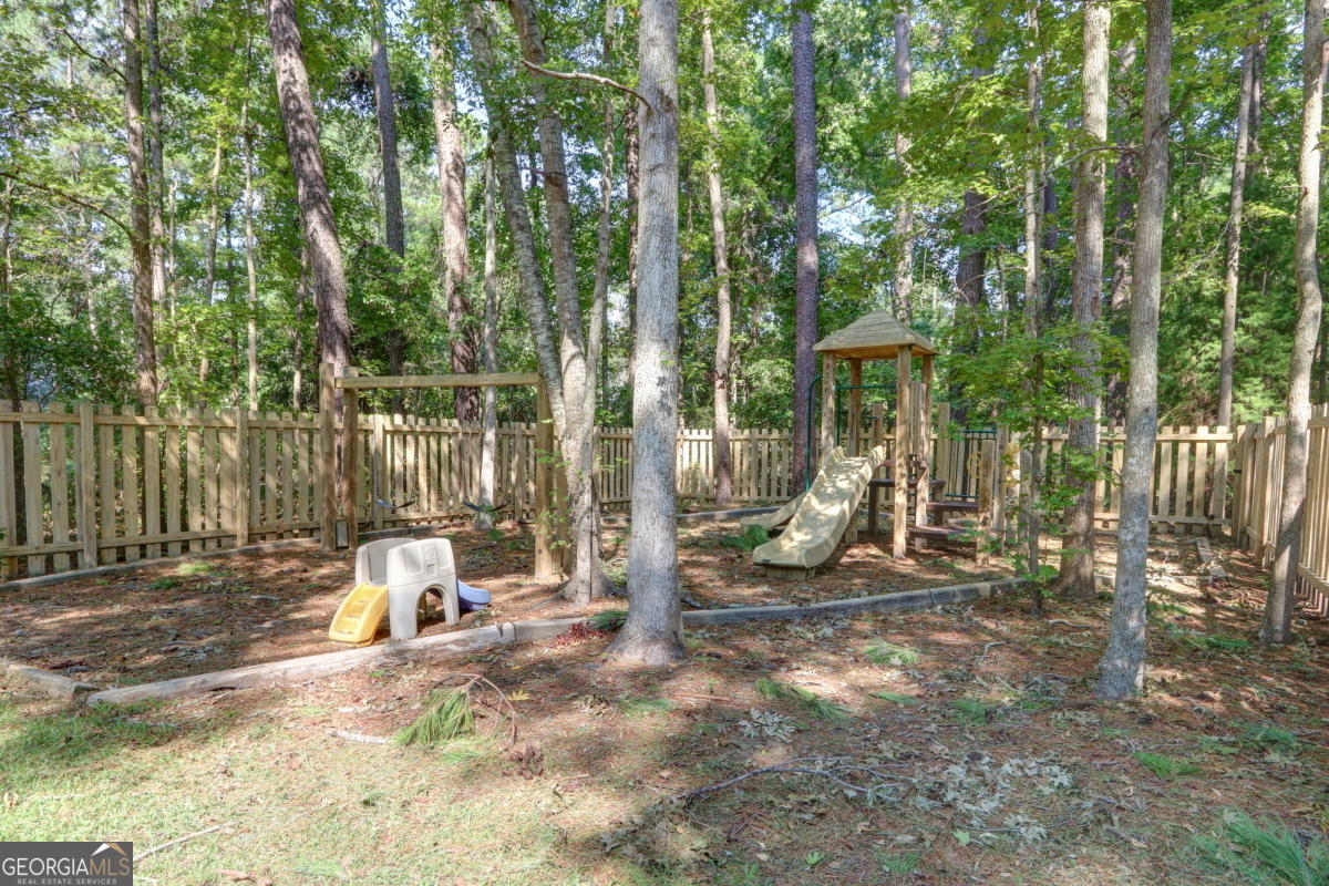 401 North Cromwell Road, Unit 2Q Savannah, GA 31410 - Photo 33 of 35 a view of a park with slide and bench