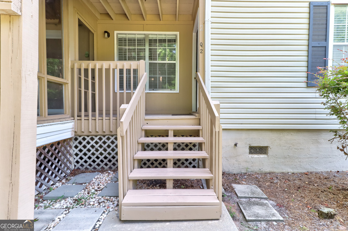 401 North Cromwell Road, Unit 2Q Savannah, GA 31410 - Photo 4 of 35 a view of a balcony with a potted plant