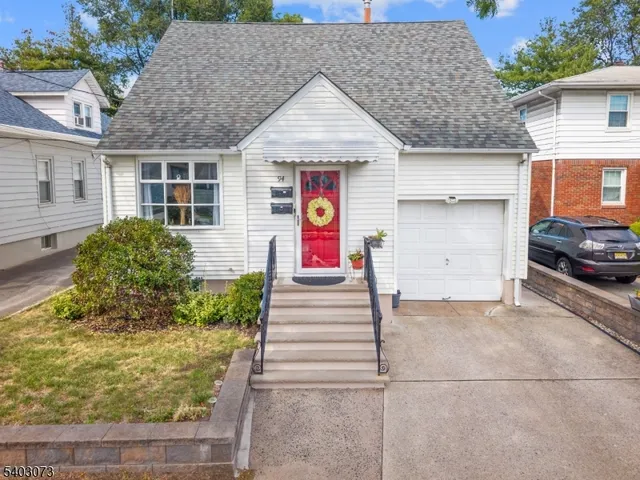 a front view of house with outdoor space