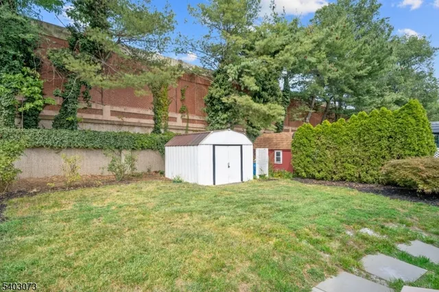 a house with a tree in front of it