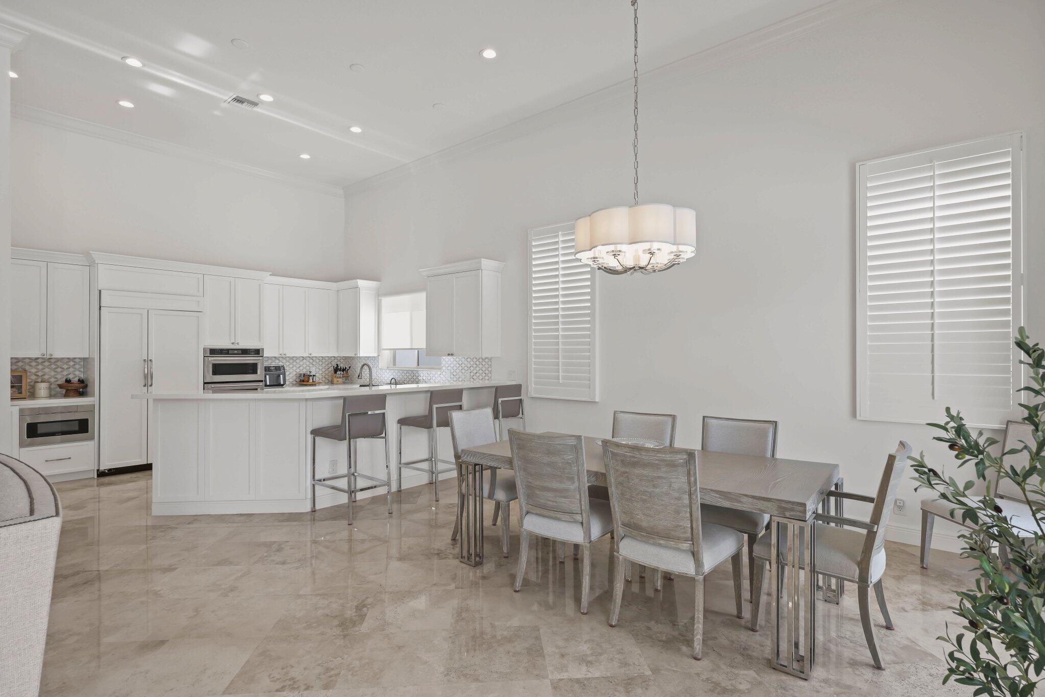 7150 Mallorca Crescent Boca Raton, FL 33433 - Photo 21 of 51 Dining Area to Open Kitchen