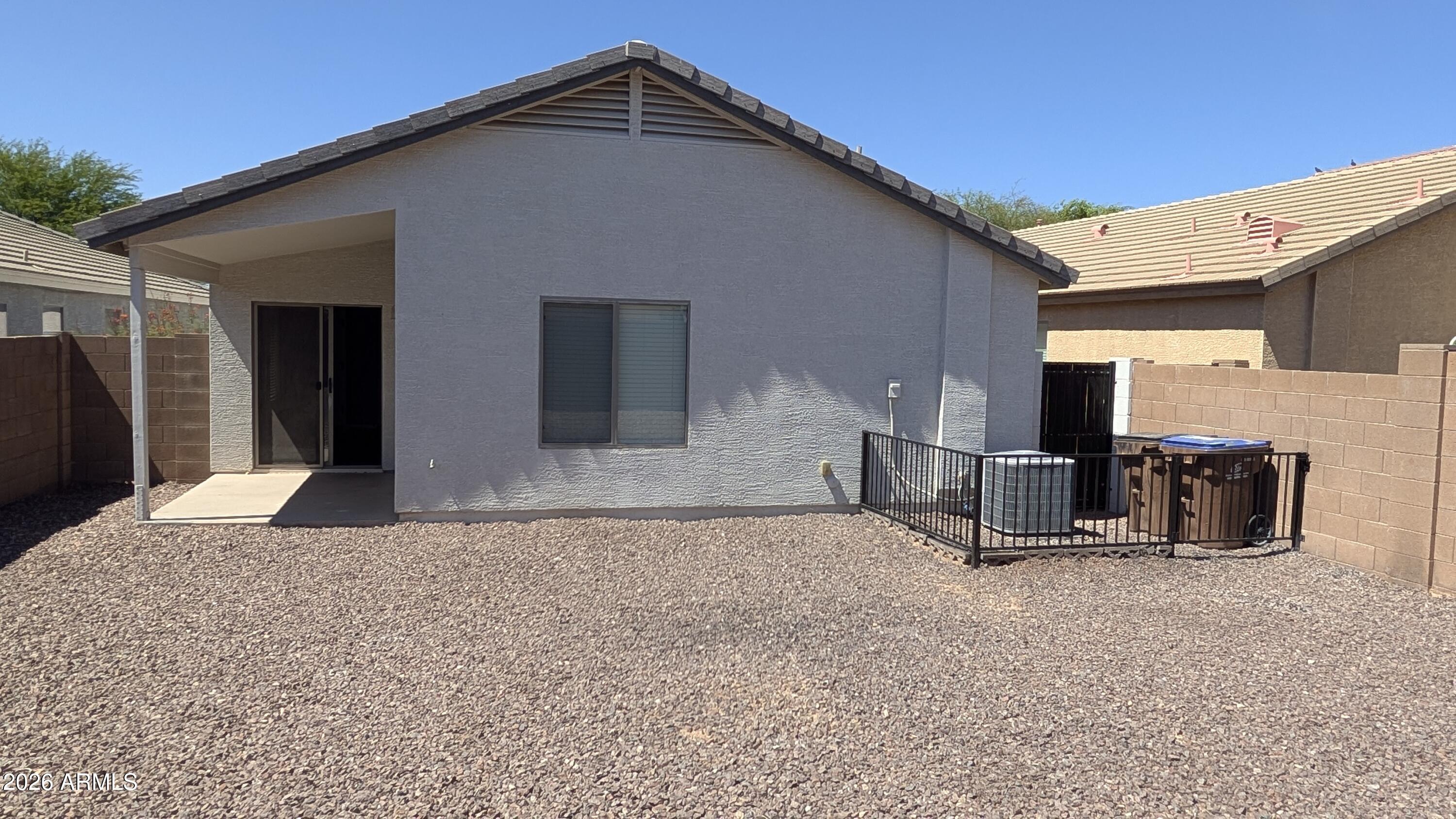 1377 East Pryor Road San Tan Valley, AZ 85140 - Photo 5 of 31 a view of a house with a yard