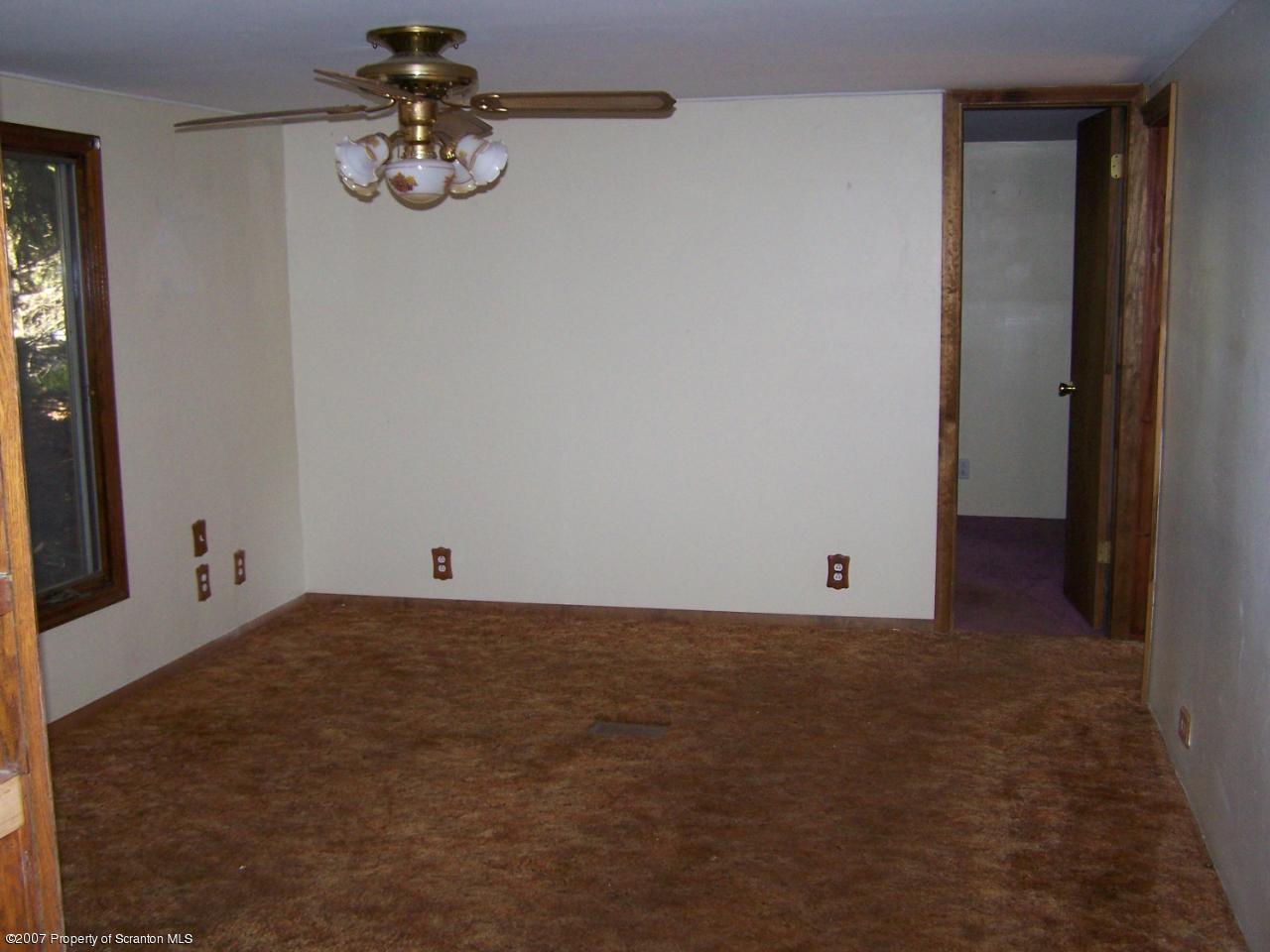 1624 Mack Road Hop Bottom, PA 18824 - Photo 7 of 8 a view of a room with a window