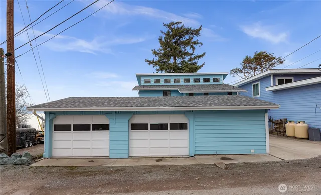 a view of a house with a garage