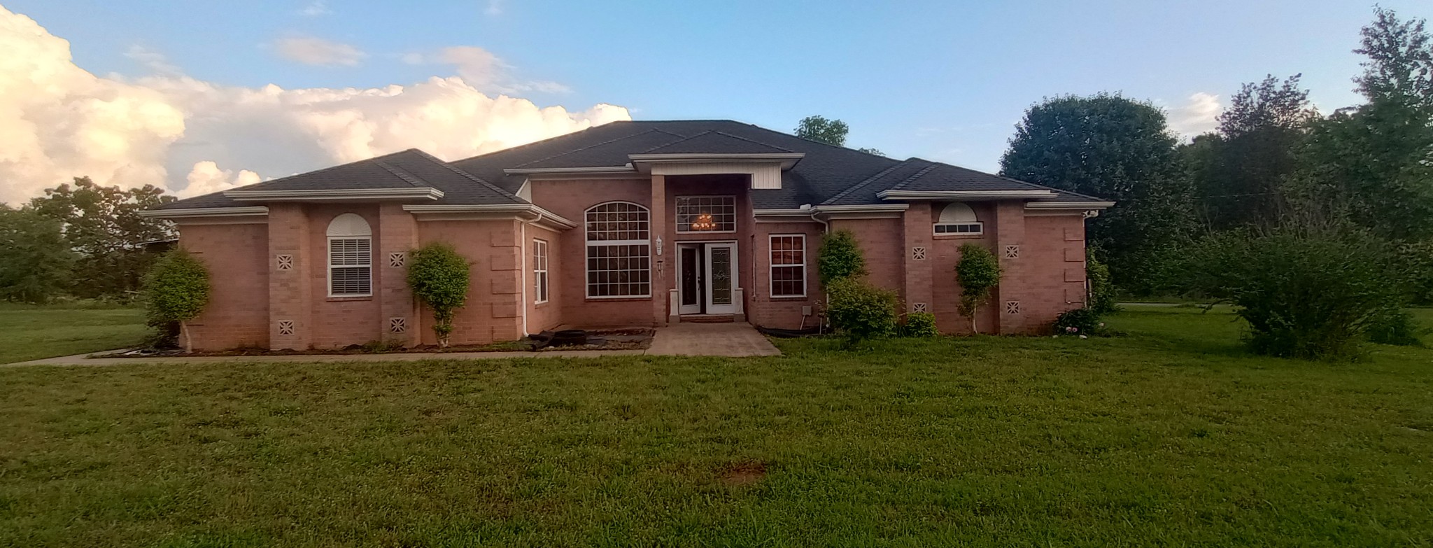 4389 Veals Road Murfreesboro, TN 37127 - Photo 1 of 8 a front view of a house with a yard