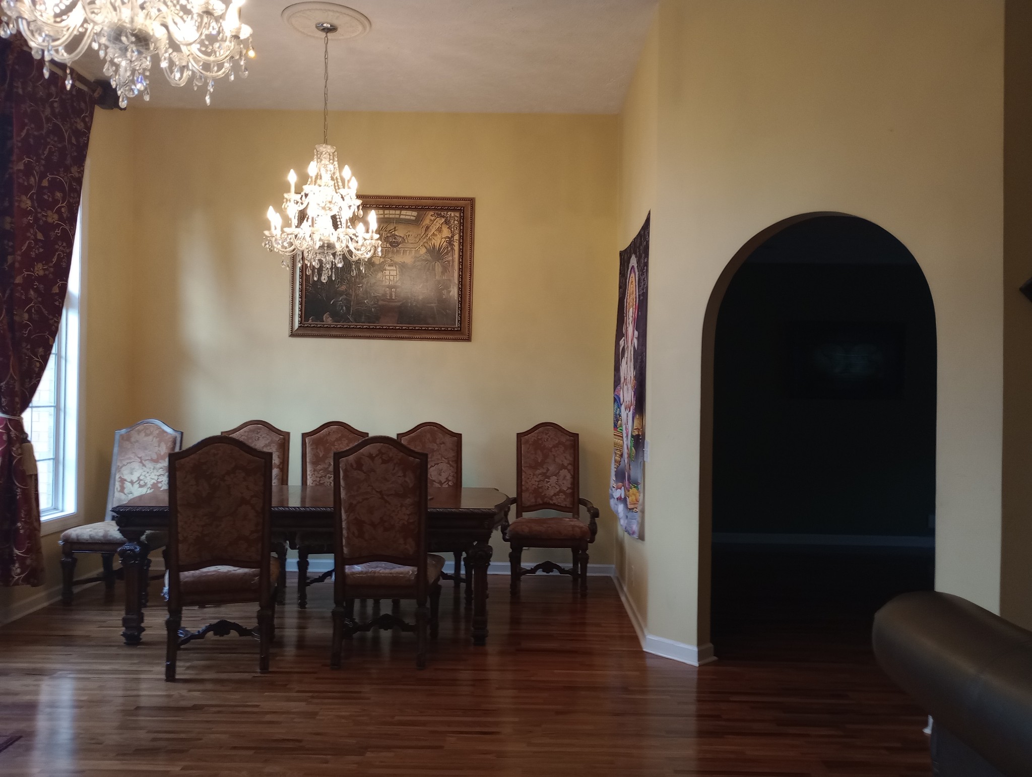 4389 Veals Road Murfreesboro, TN 37127 - Photo 8 of 8 a view of a dining room with furniture and chandelier
